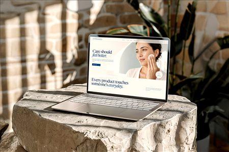 Skincare website concept displayed on a laptop